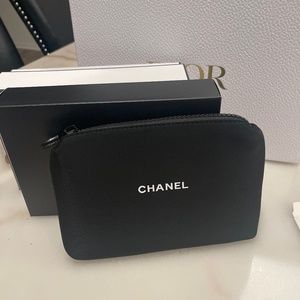 Chanel black cosmetic bag / beauty pouch